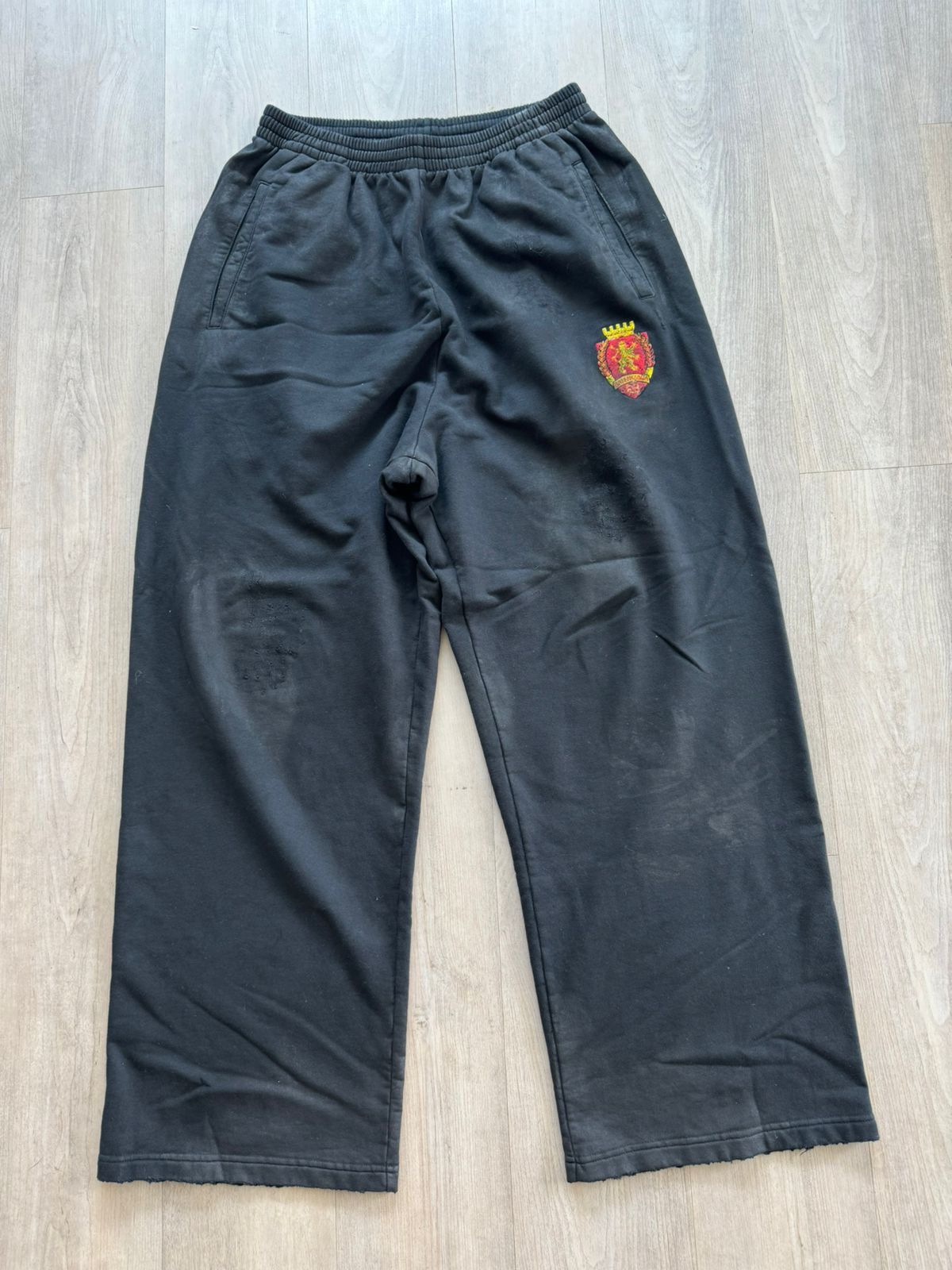 image of Balenciaga Crest Destroyed Skater Sweatpants in Navy, Men's (Size 36)