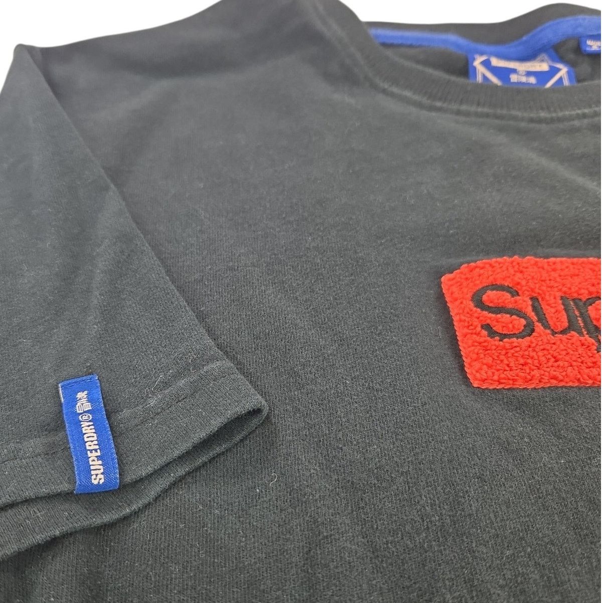 Superdry SuperDry | Black T-shirt with Fuzzy Wuzzy Logo | Size Small Size US S / EU 44-46 / 1 - 4 Thumbnail