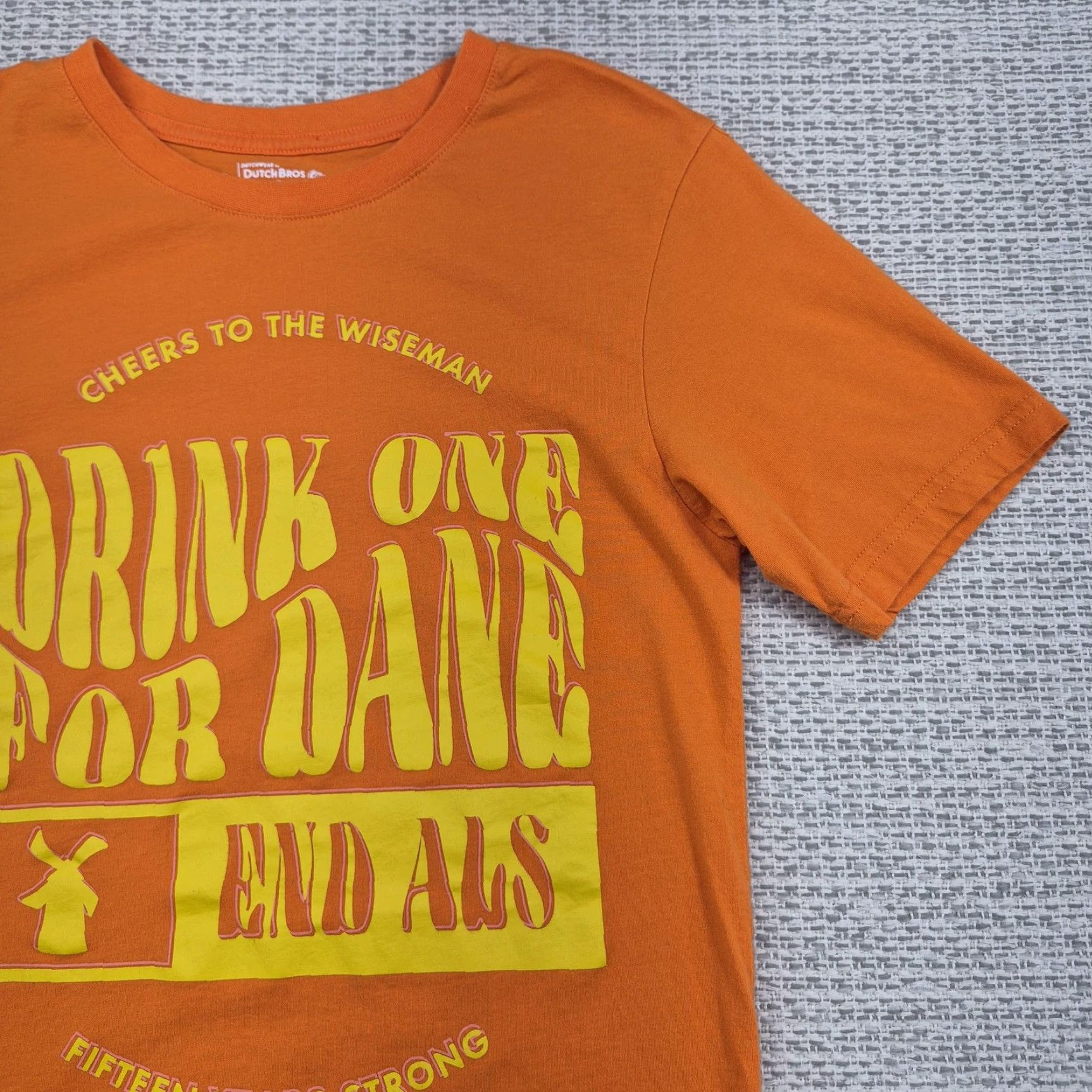 Vintage Dutch Bros Drink One For Dane Shirt T-Shirt Unisex Adults XS Orange Coffee ALS Awareness 15 Years Strong Size US XS / EU 42 / 0 - 2 Thumbnail