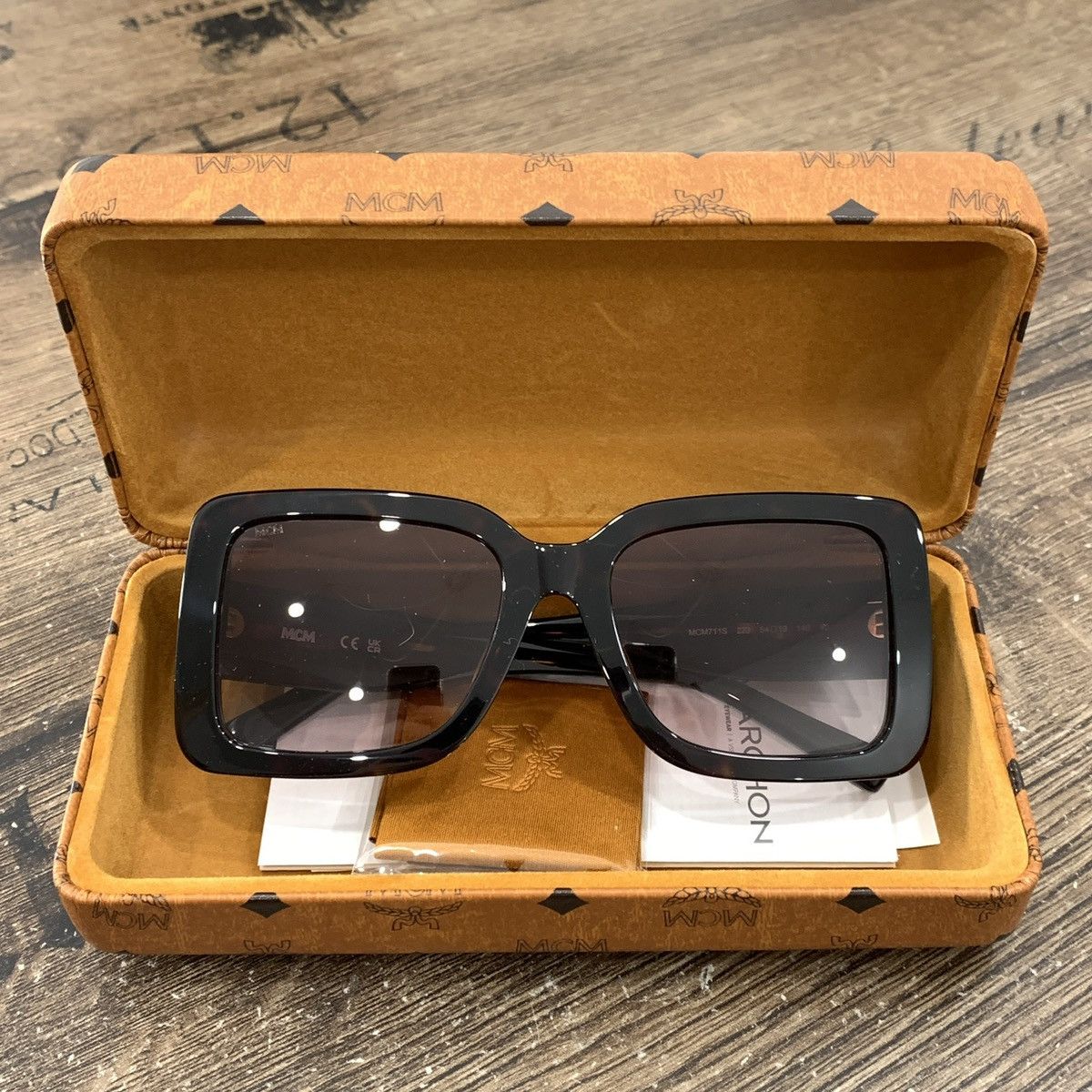 image of MCM Women Sunglassrs in Black