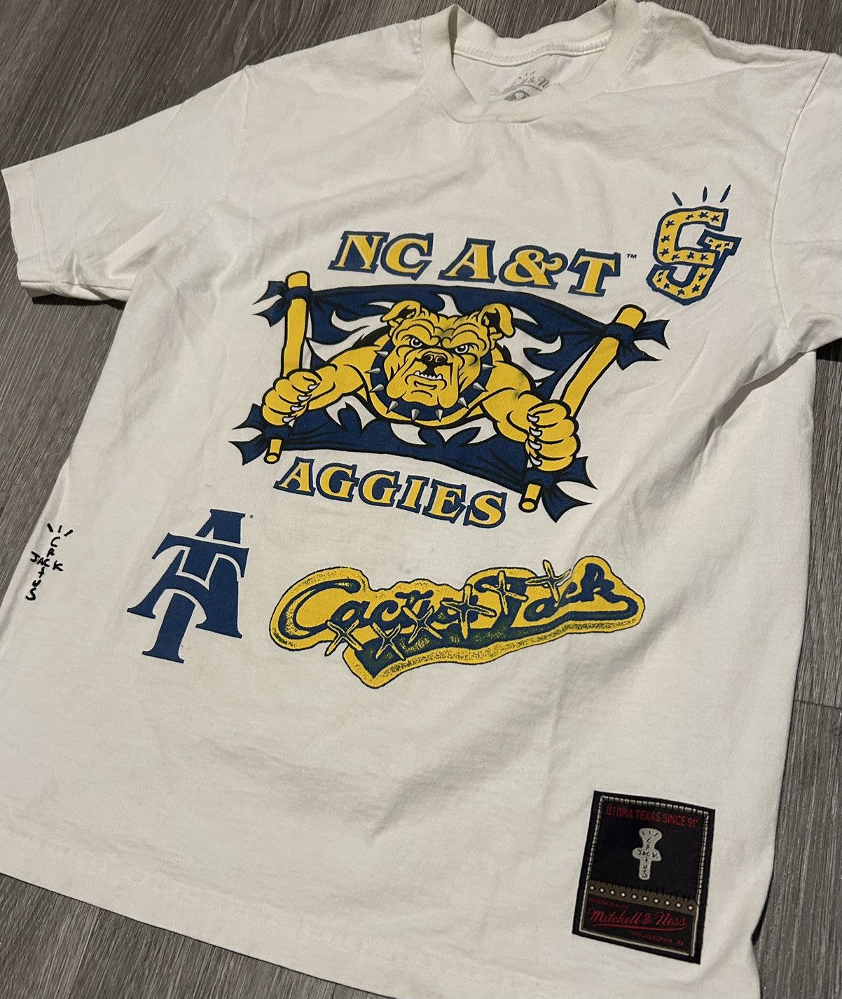 Mitchell & Ness × Travis Scott Mitchell & Ness x Cactus Jack North Carolina A&T college tee Size US M / EU 48-50 / 2 - 3 Thumbnail