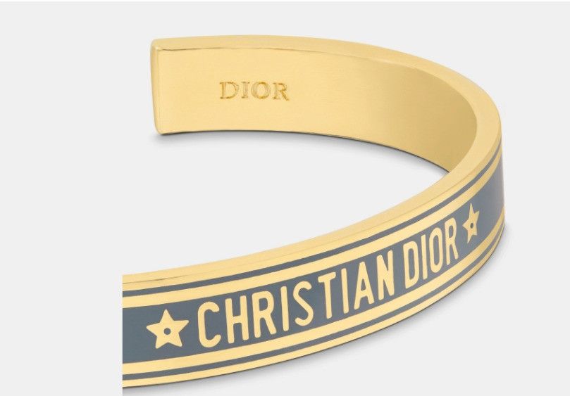 o1w1db11224 Size: OS / Code Bangle in Gold & Blue