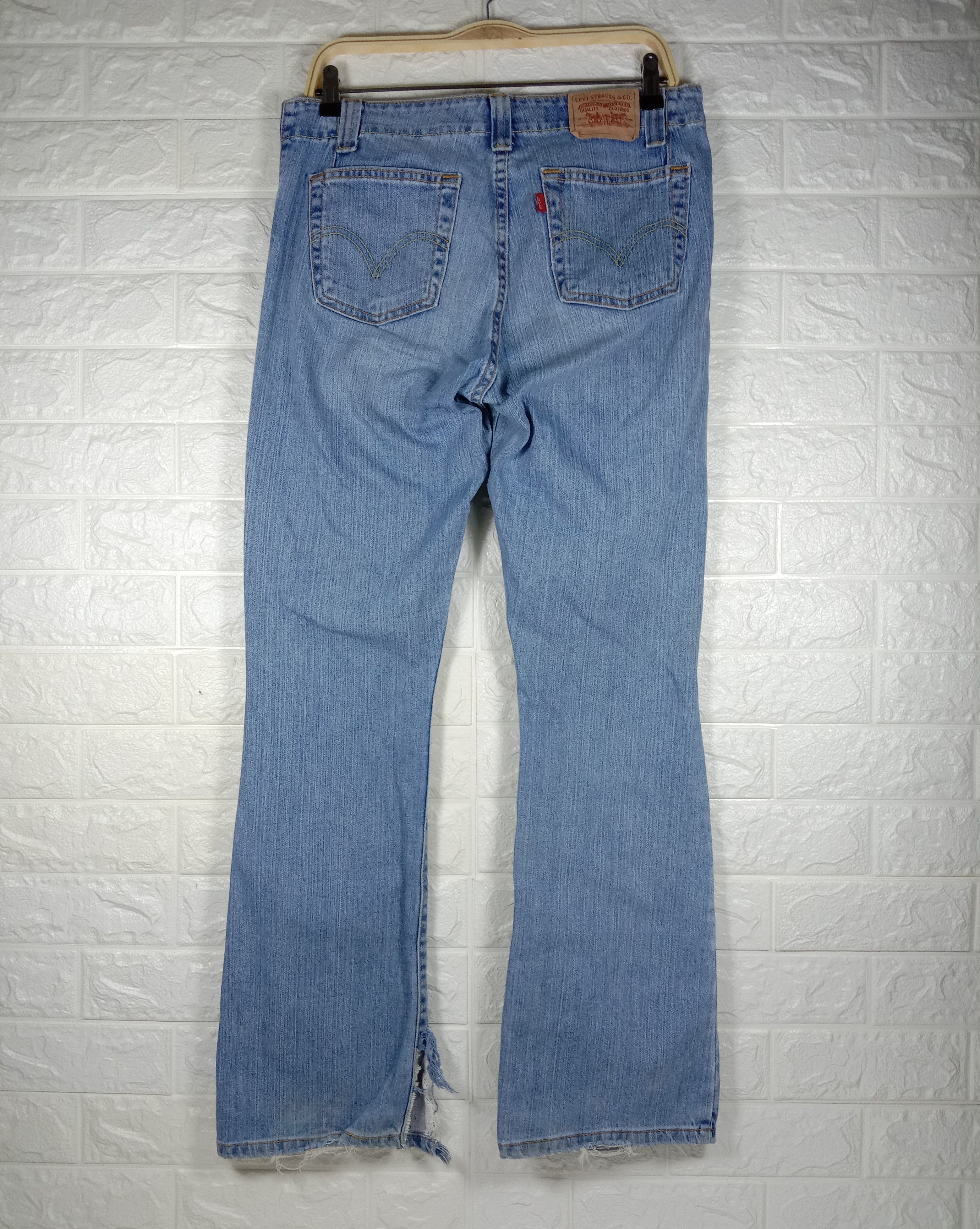 Levi's Vintage Levi’s 525 Flare Jeans Light Wash Distressed Denim Size 33" - 5 Thumbnail