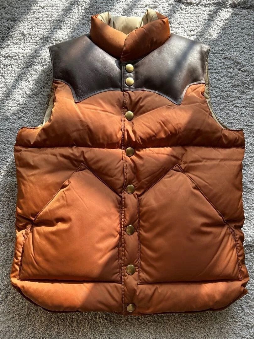 Rocky Mountain Featherbed rocky mountain down vest in brown color Size US S / EU 44-46 / 1 - 1 Thumbnail