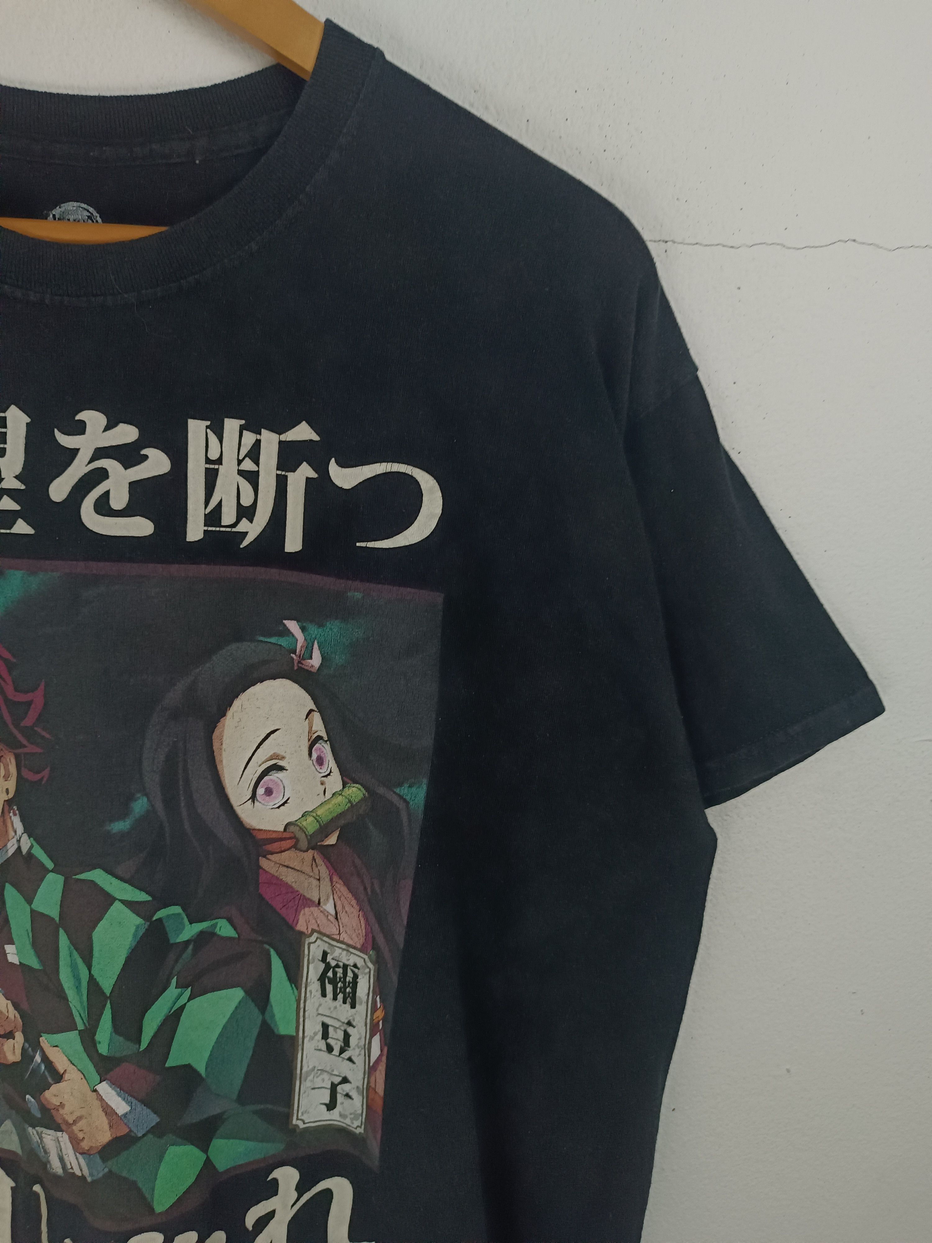 Anime VINTAGE KIMETSU NO YAIBA DEMON SLAYER JAPAN RELEASE TEE Size US L / EU 52-54 / 3 - 6 Thumbnail