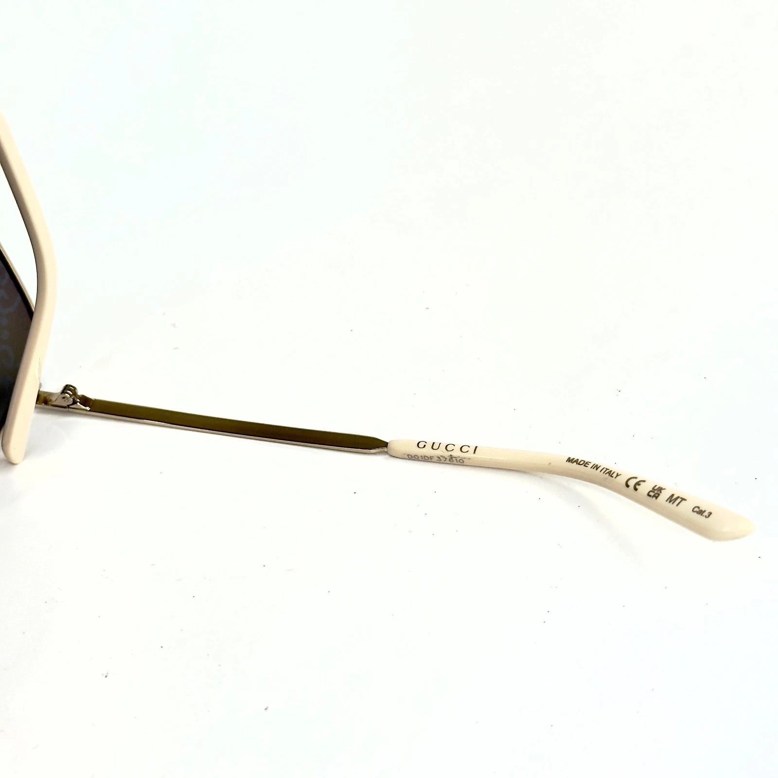 Gucci GUCCI 0802 Gold Blue Rainbow GG Print Gg0802S Sunglasses 004 Size ONE SIZE - 7 Thumbnail