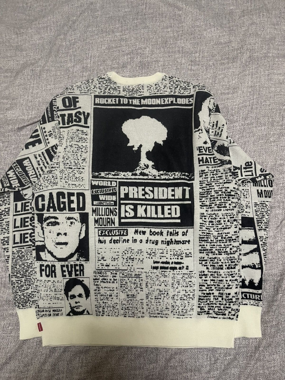 Supreme newsprint sweater white