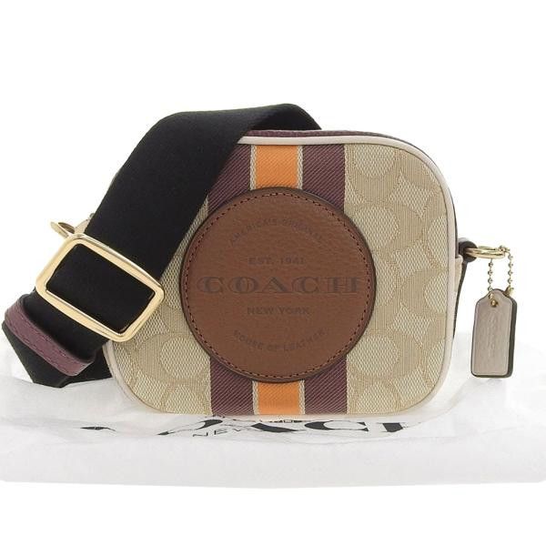 image of Coach Signature Canvas Mini Dempsey Camera Bag in Brown, Women's