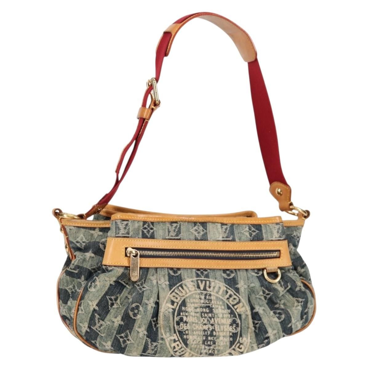 Louis Vuitton Louis Vuitton Porte Epaule Raye Handbag Striped Monogram Denim Size ONE SIZE - 1 Thumbnail