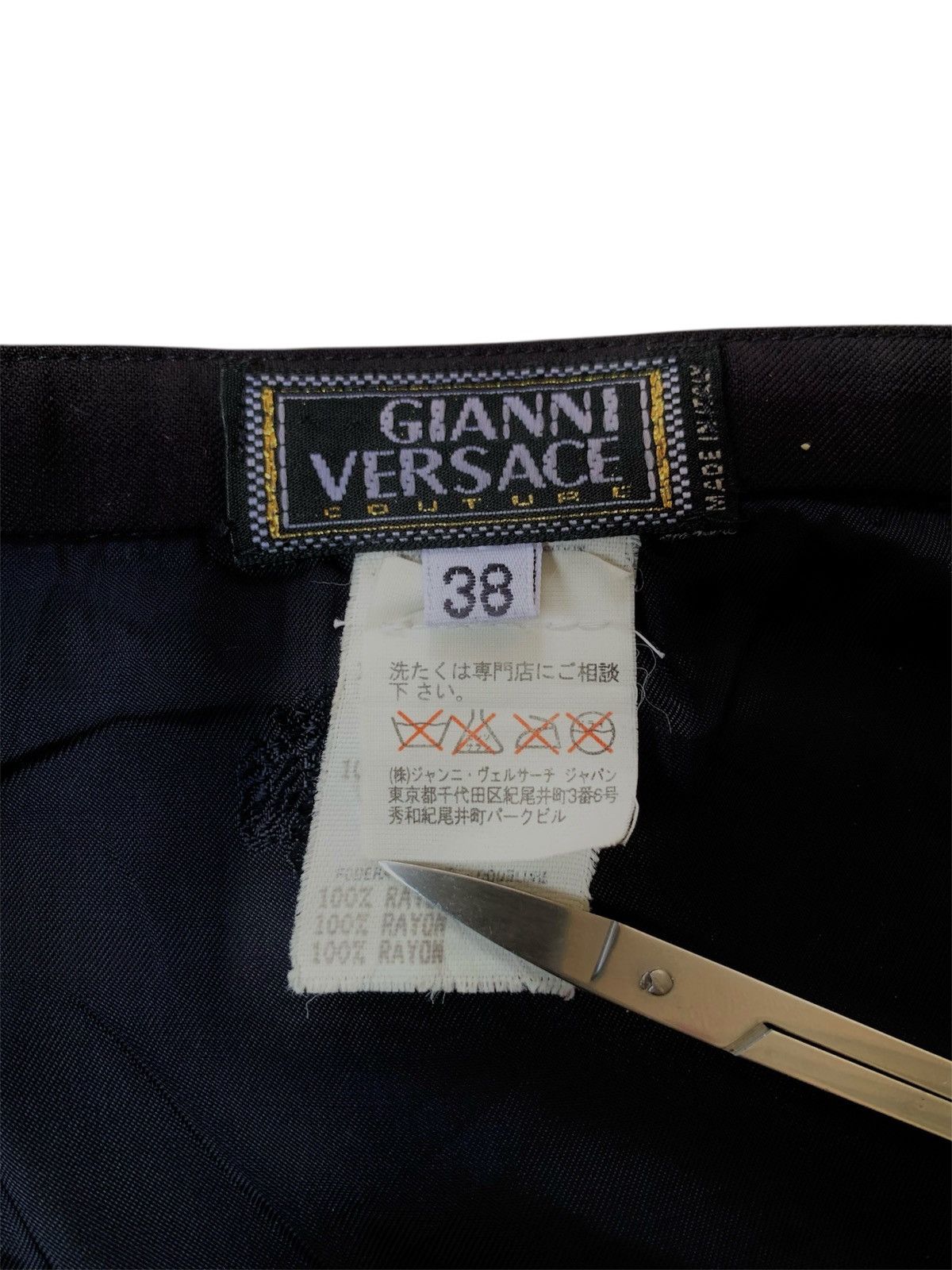 Vintage Gianni Versace mini skirt with buckle belt