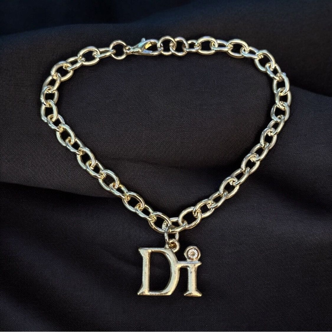 Other Diamond International gold tone charm bracelet Size ONE SIZE - 1 Thumbnail