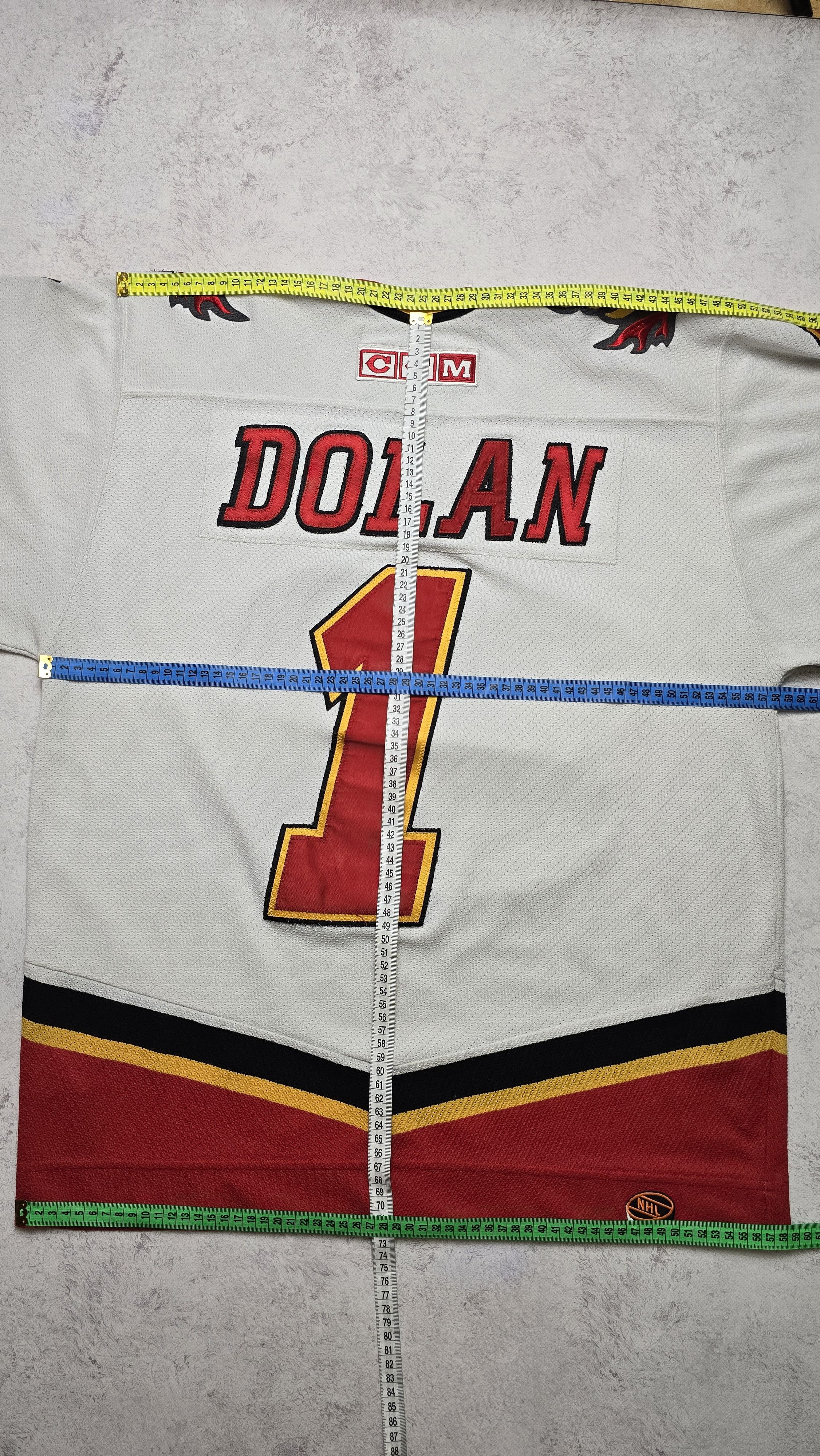 Ccm VTG CCM Air-Knit Calgary Flames Dolan #1 NHL Hockey Jersey Size US M / EU 48-50 / 2 - 4 Thumbnail