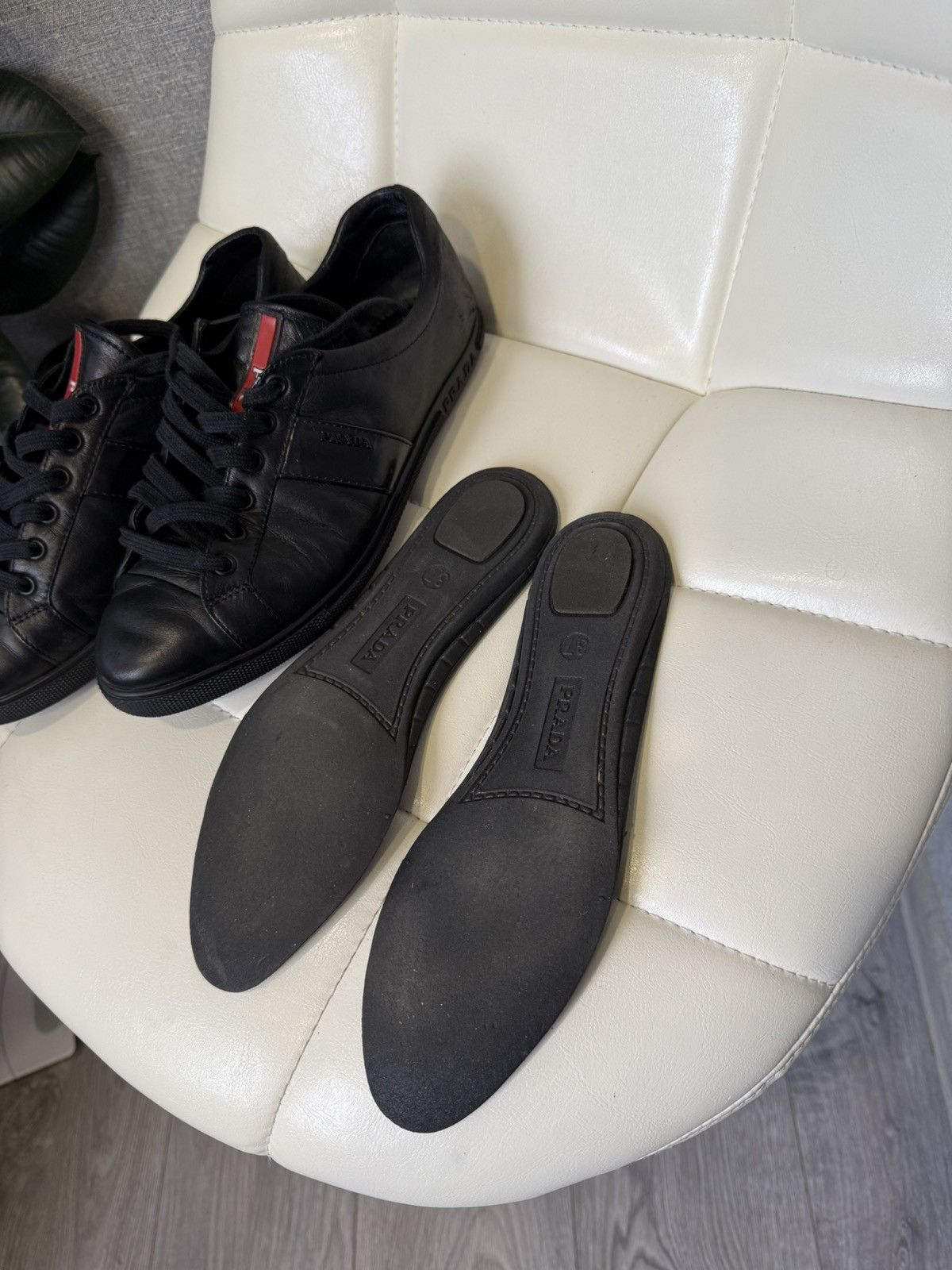 Prada Prada Black Leather Low-Top Sneakers with Red Stripe Logo Size US 7 / IT 37 - 22 Thumbnail