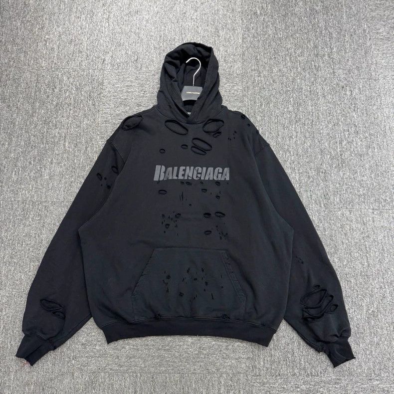 Balenciaga BALENCIAGA Ripped Hoodie | Grailed