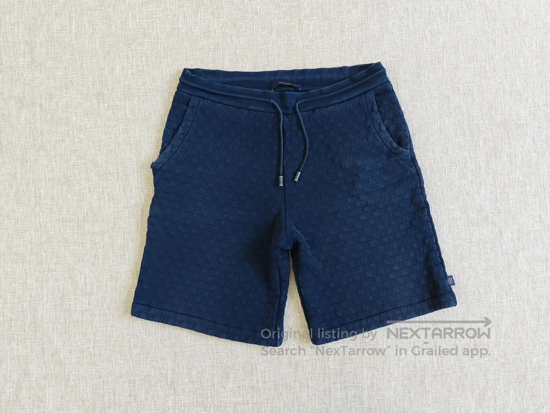 Louis Vuitton Men's Checkered Embossed Shorts.