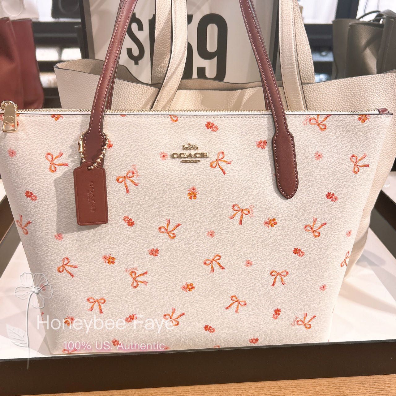 image of Coach Zip Top Tote With Bow Print Cn627, Women's