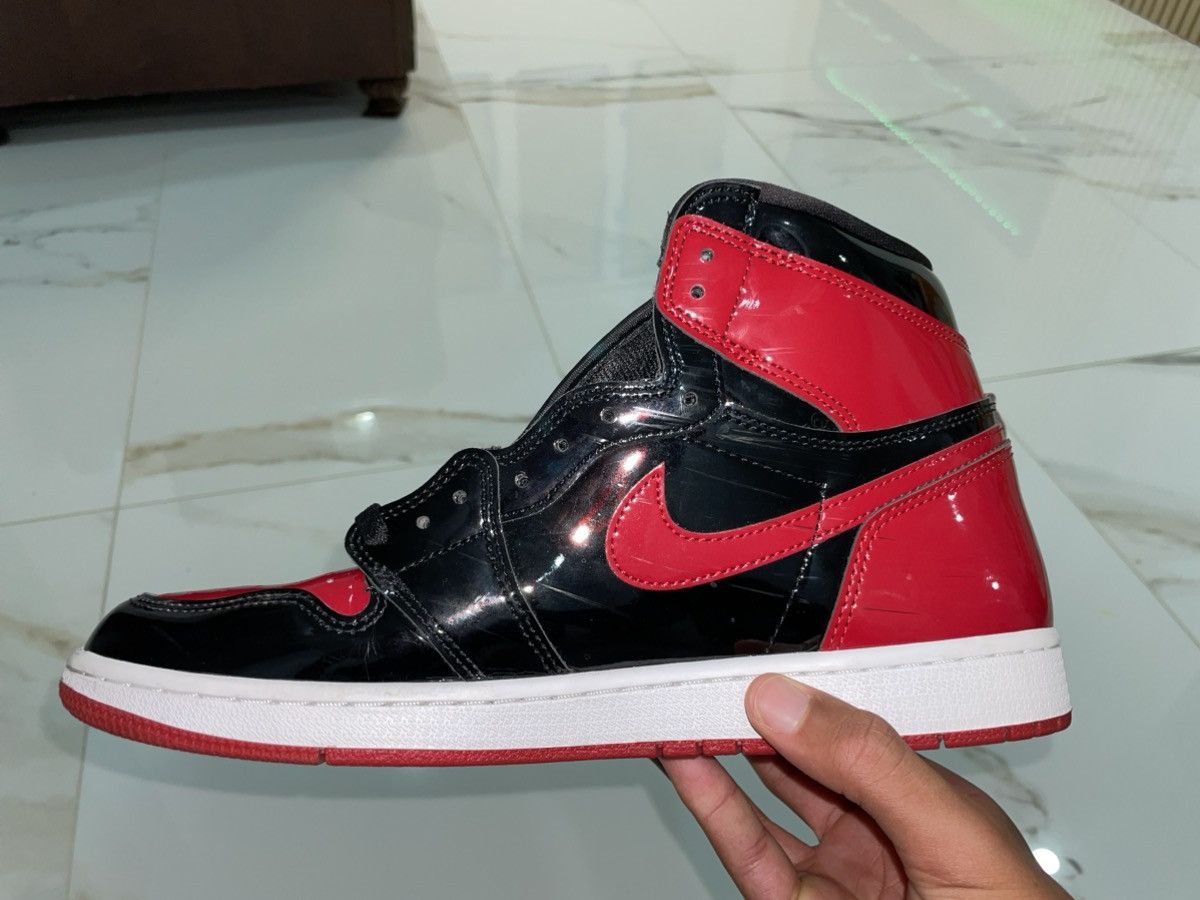 Jordan Brand Jordan 1 Retro High OG Patent Bred Size US 11 / EU 44 - 9 Thumbnail