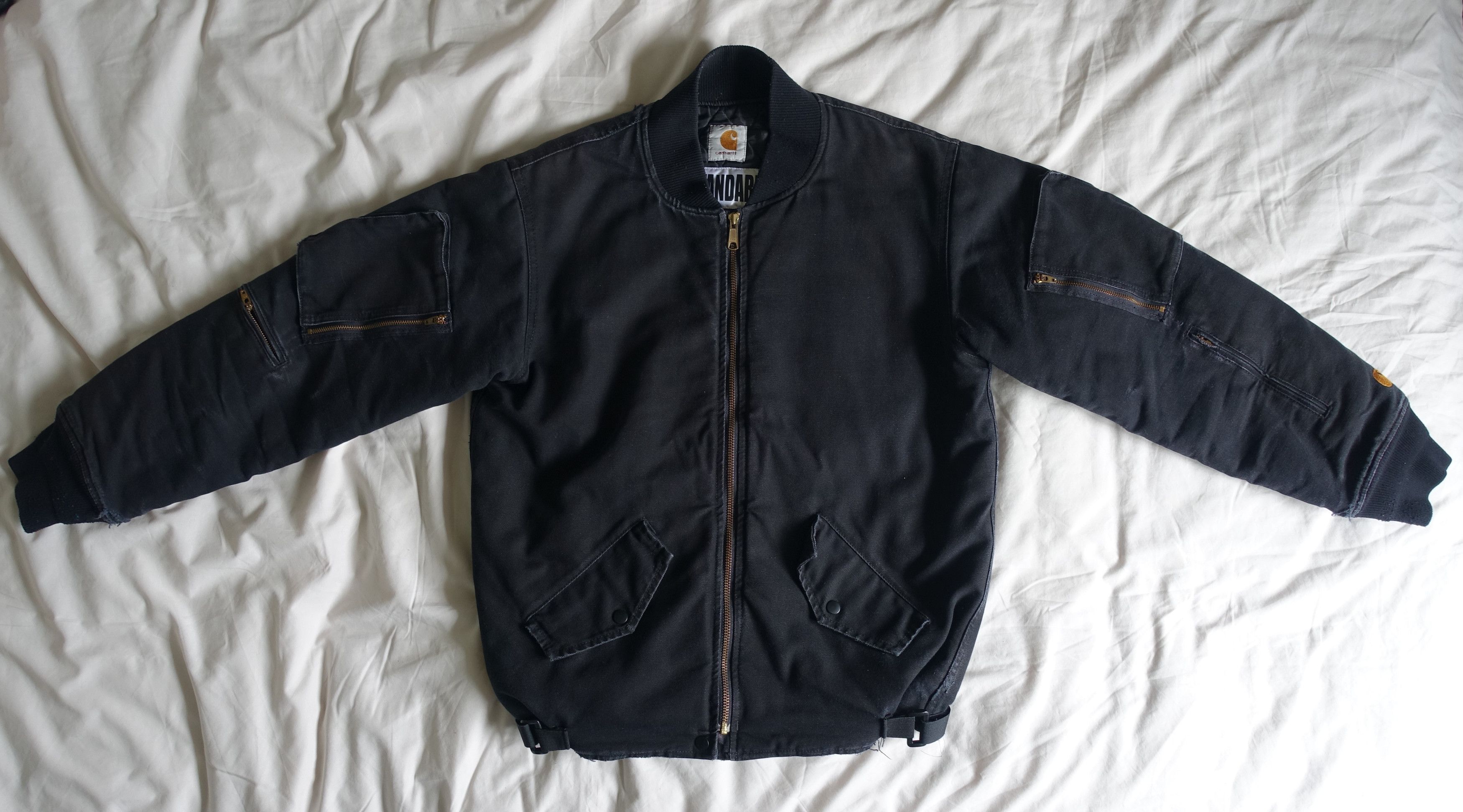 image of Carhartt Wip Standard Canvas Multi Pocket Adjustable Hem Thrashed Bomber in Black (Size Small)