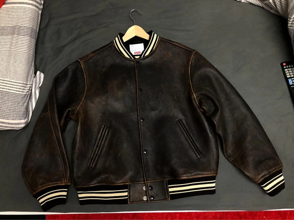 Supreme distressed leather varsity jacket