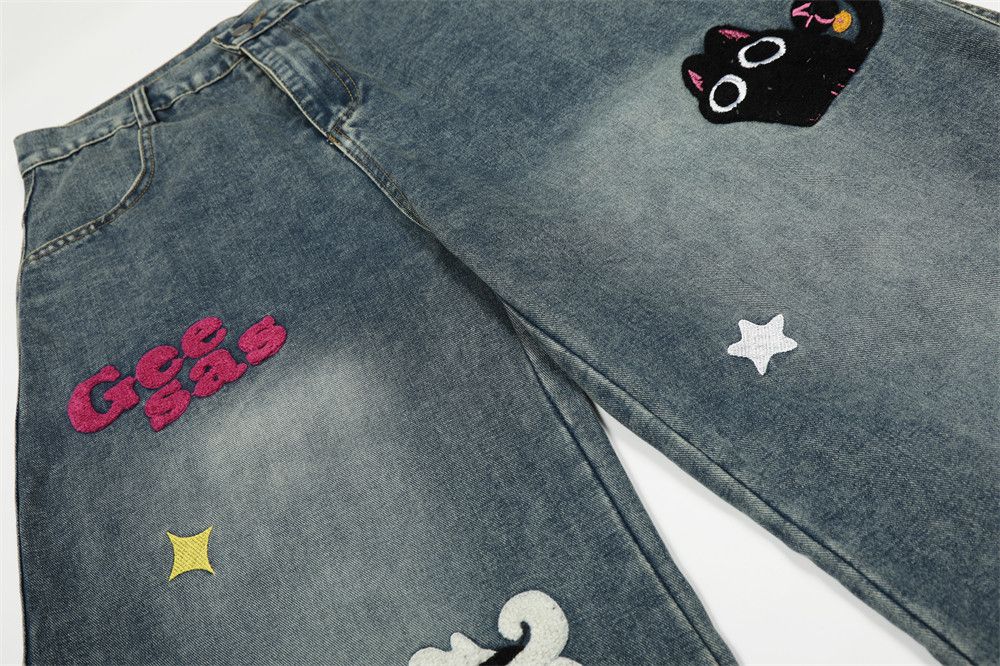 Jean Men's distressed cartoon embroidered washed scimitar jeans Size US 32 / EU 48 - 4 Thumbnail