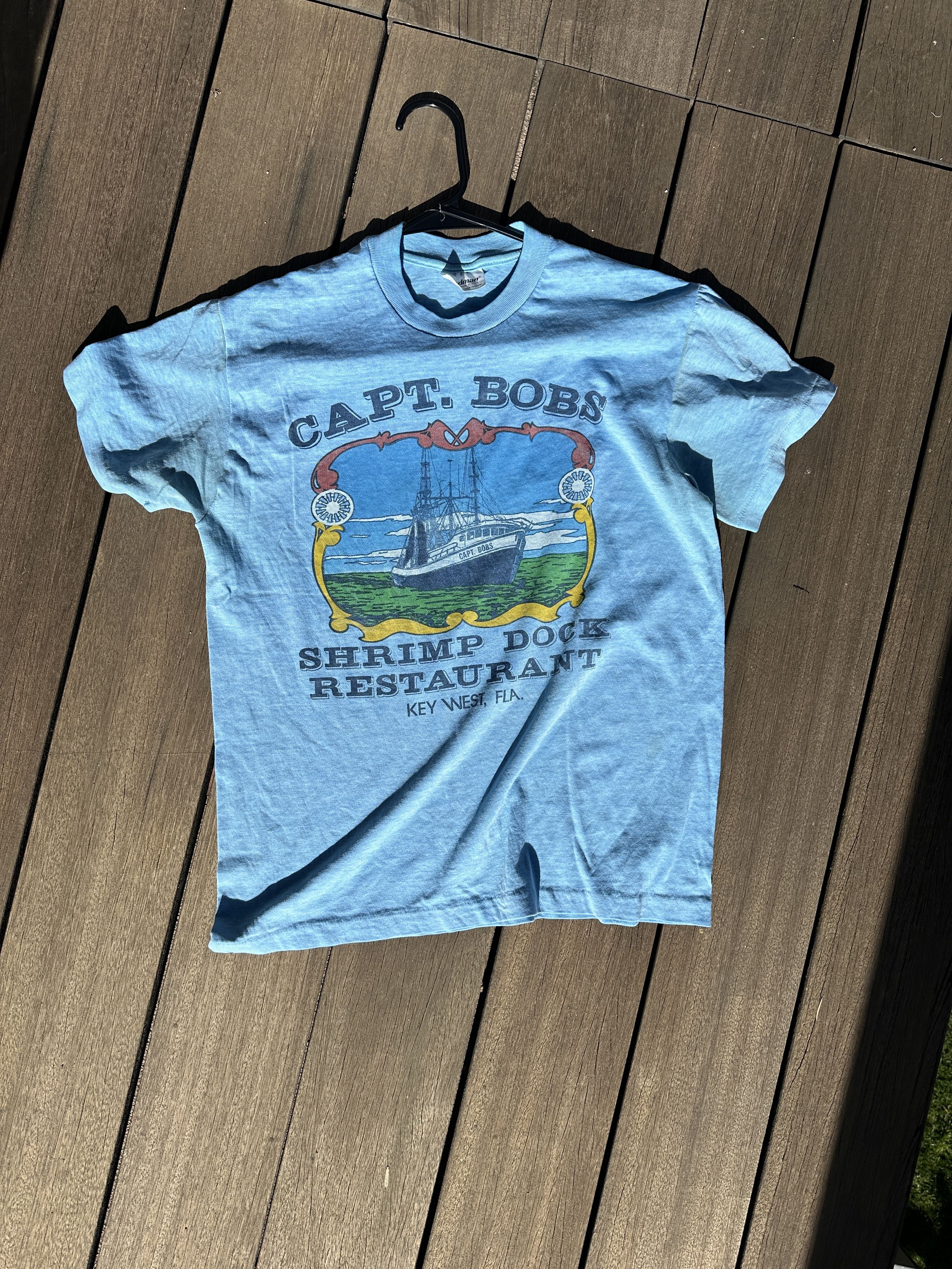 image of Vintage Capt. Bobs Shrimp Dock Restaurant Tshirt in Blue, Men's (Size Large)