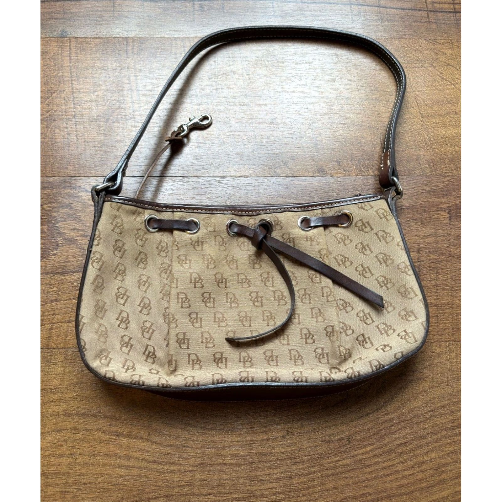Dooney & Bourke Dooney & Bourke handbag signature canvas with leather strap Baguette Style Bag Width 11" Brown Canvas Zip 6.5" Height Small Size ONE SIZE - 2 Thumbnail