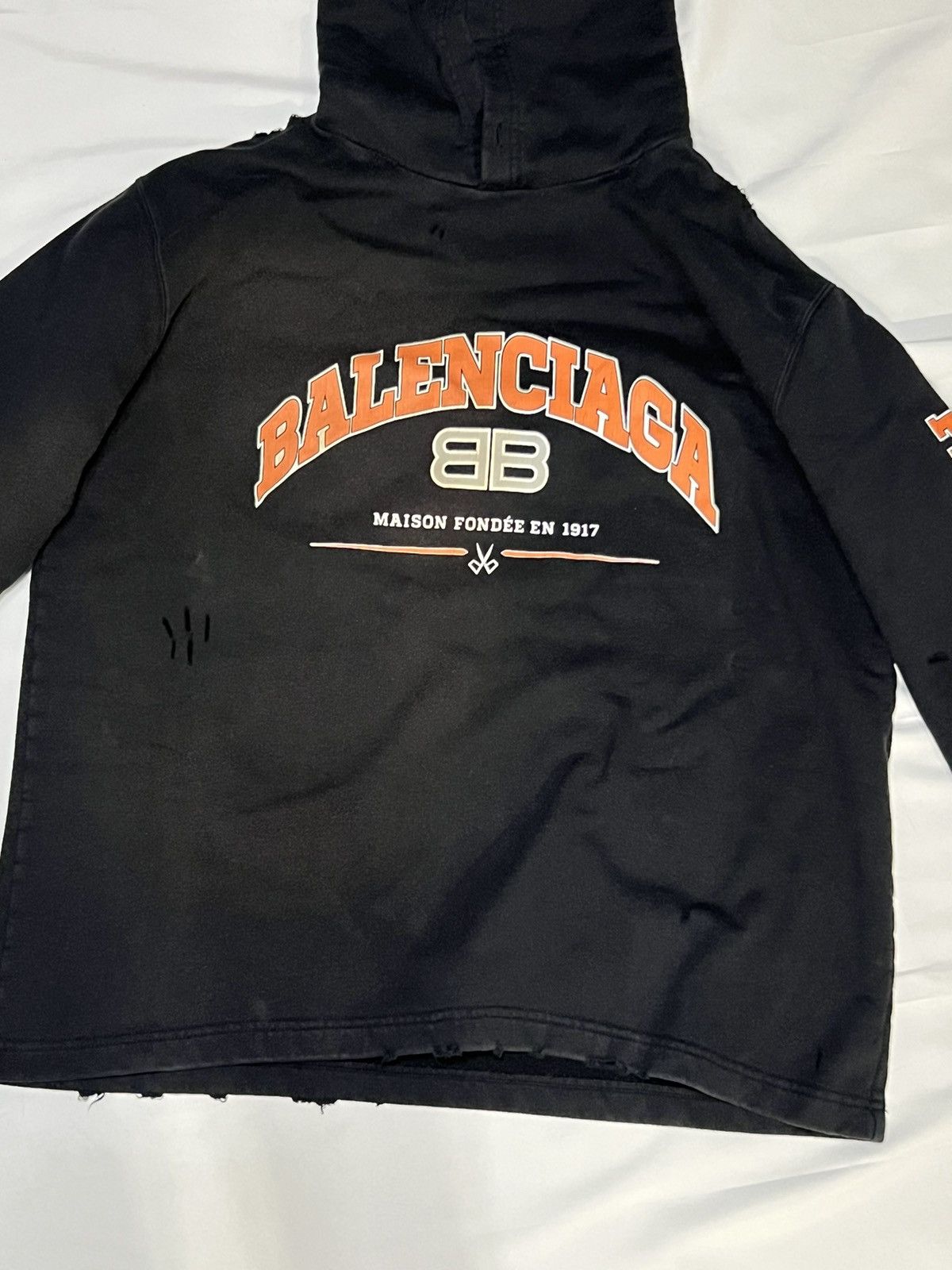 image of Balenciaga Logo Distressed Hoodie in Black/Orange, Men's (Size XS)