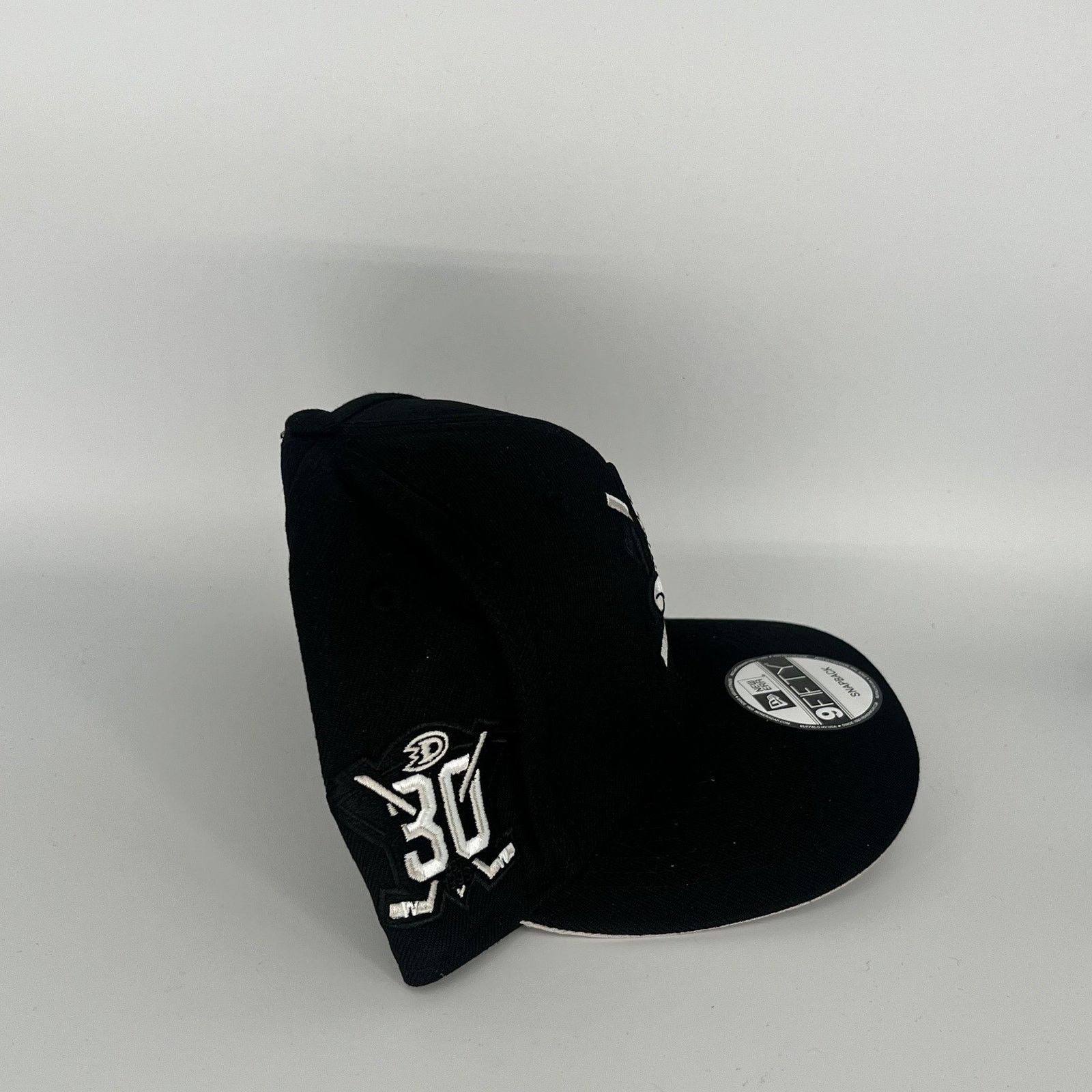 New Era Black Anaheim Ducks 30th Anniversary Side Patch New Era NHL Size ONE SIZE - 3 Thumbnail