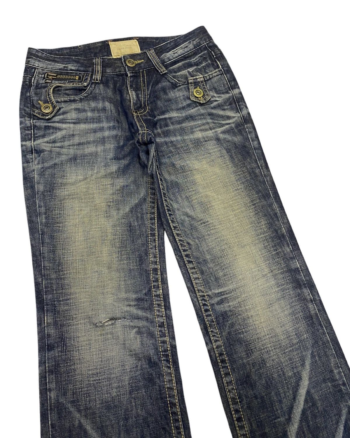 FLARE JEANS LOLITA WASHED DISTRESSED DENIM JEANS