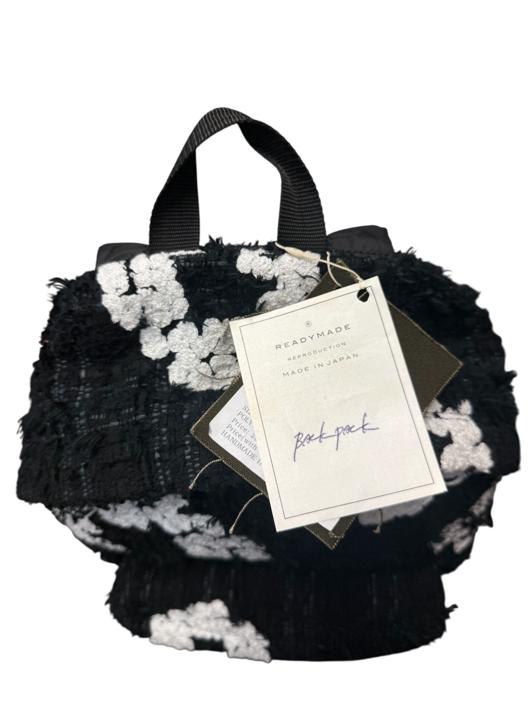 DENIM TEARS × READYMADE Cotton Wreath Tweed Backpack Size ONE SIZE - 2 Thumbnail