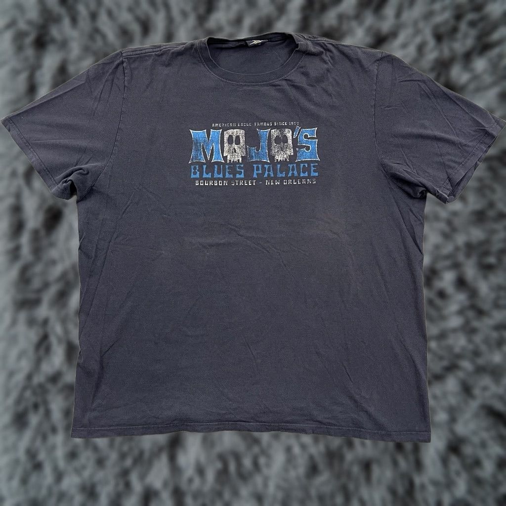 American Eagle Outfitters VINTAGE Mojos Blues Palace T-Shirt Adult 2XL Blue Graphic Tee Shirt Regular Mens Blue 2000s USA Graphic Print Cotton Skull Adventure Time Angel Bike Size US XXL / EU 58 / 5 - 1 Thumbnail