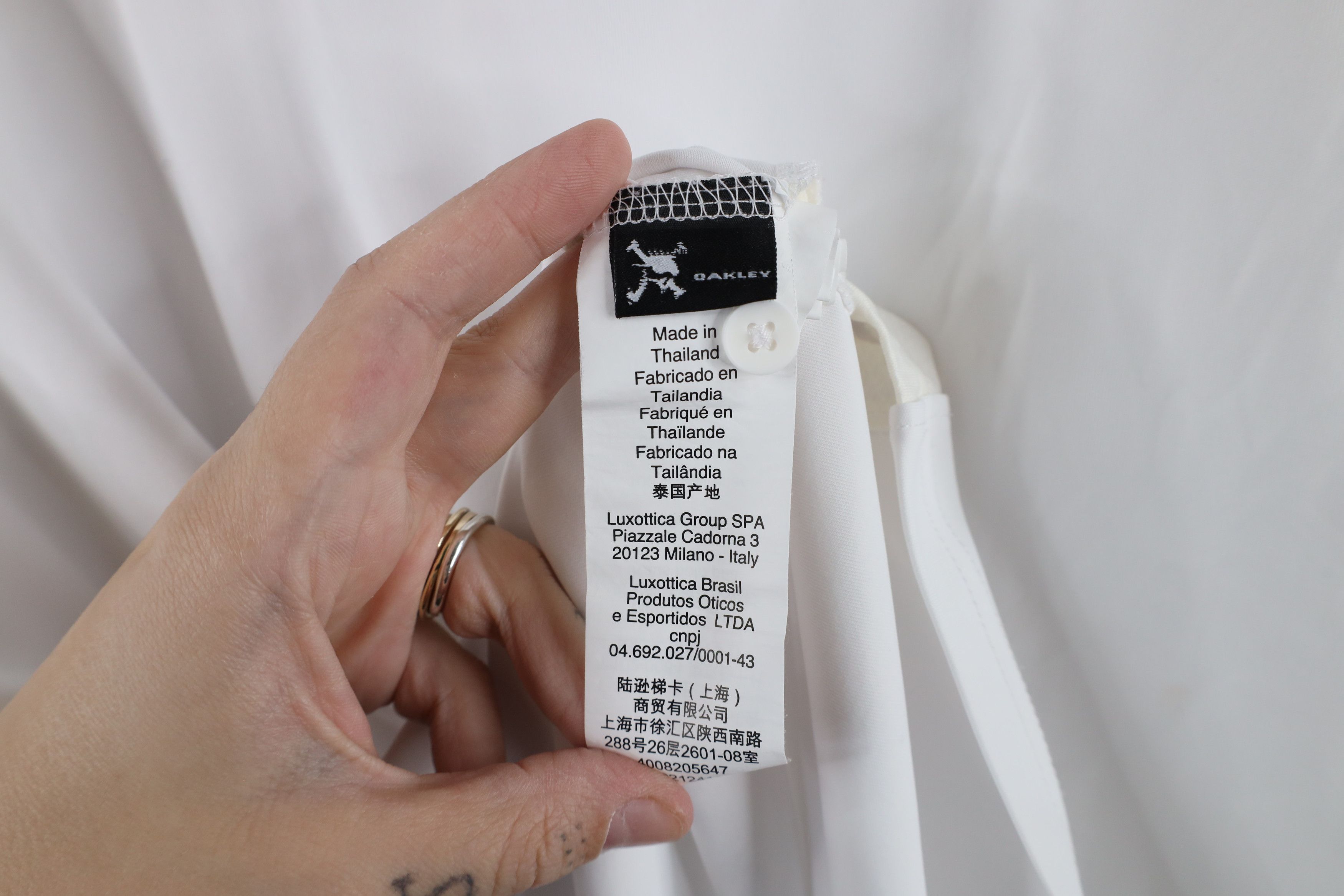 Oakley × Vintage Vintage Oakley Spell Out Vented Collared Polo Shirt White Size US L / EU 52-54 / 3 - 8 Thumbnail