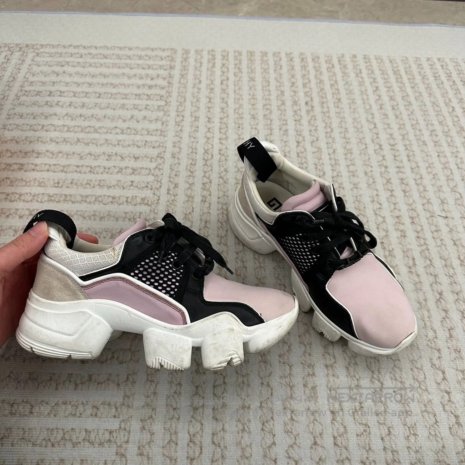 givenchy chunky dad sneakers in black and pink.