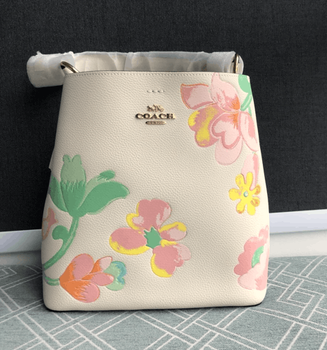 Coach selling Mini Town Bucket Bag With Floral Bow Print