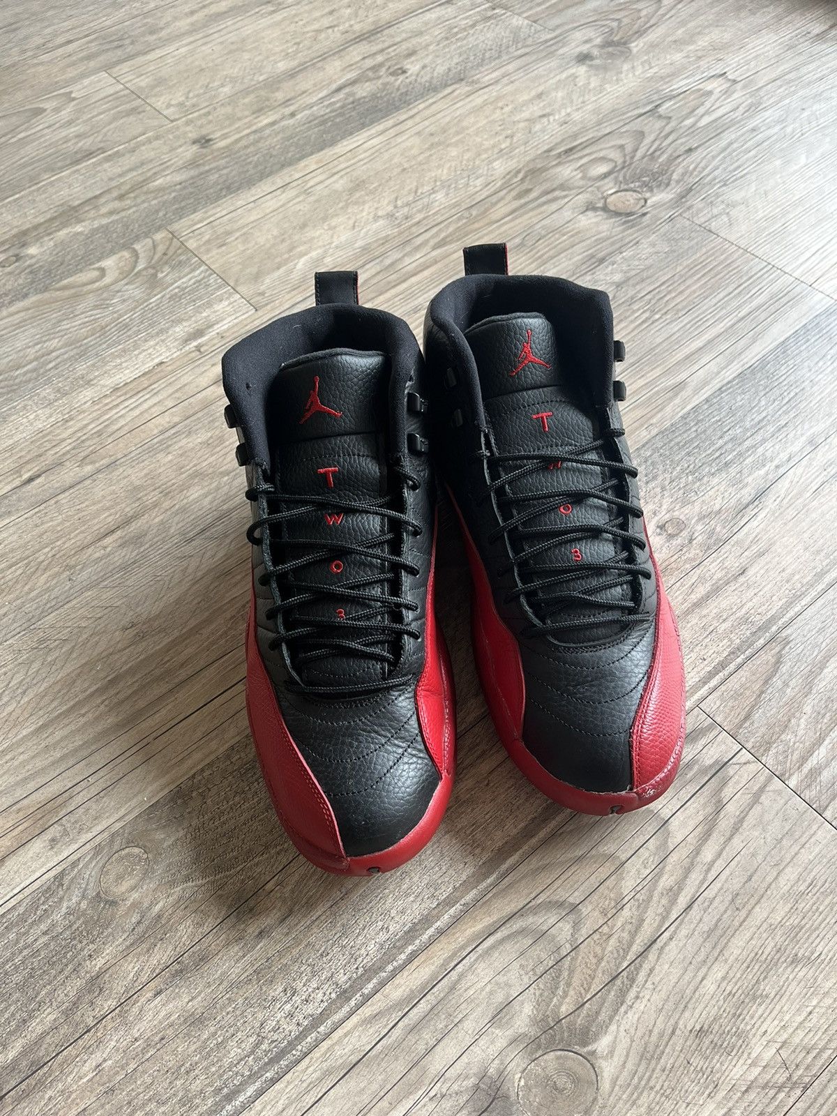 image of Jordan Brand 12 Flu Game Shoes in Black/Red, Men's (Size 11)