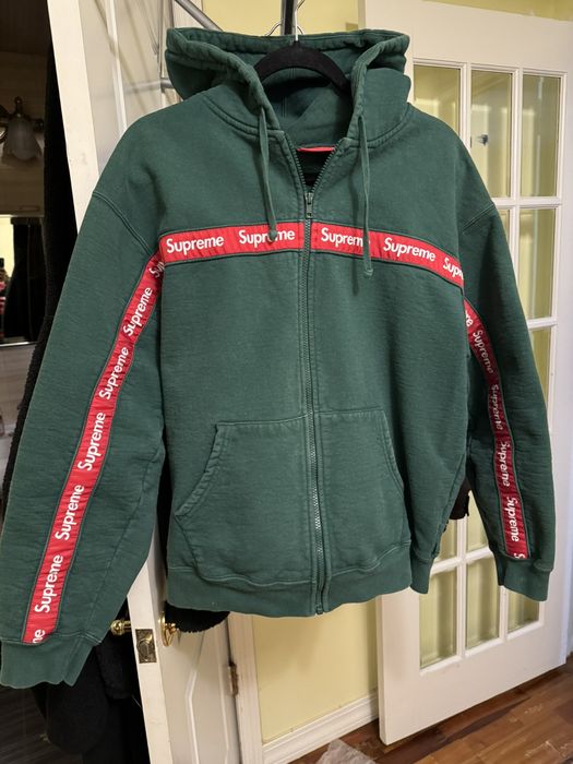 Supreme text stripe zip best sale up hoodie