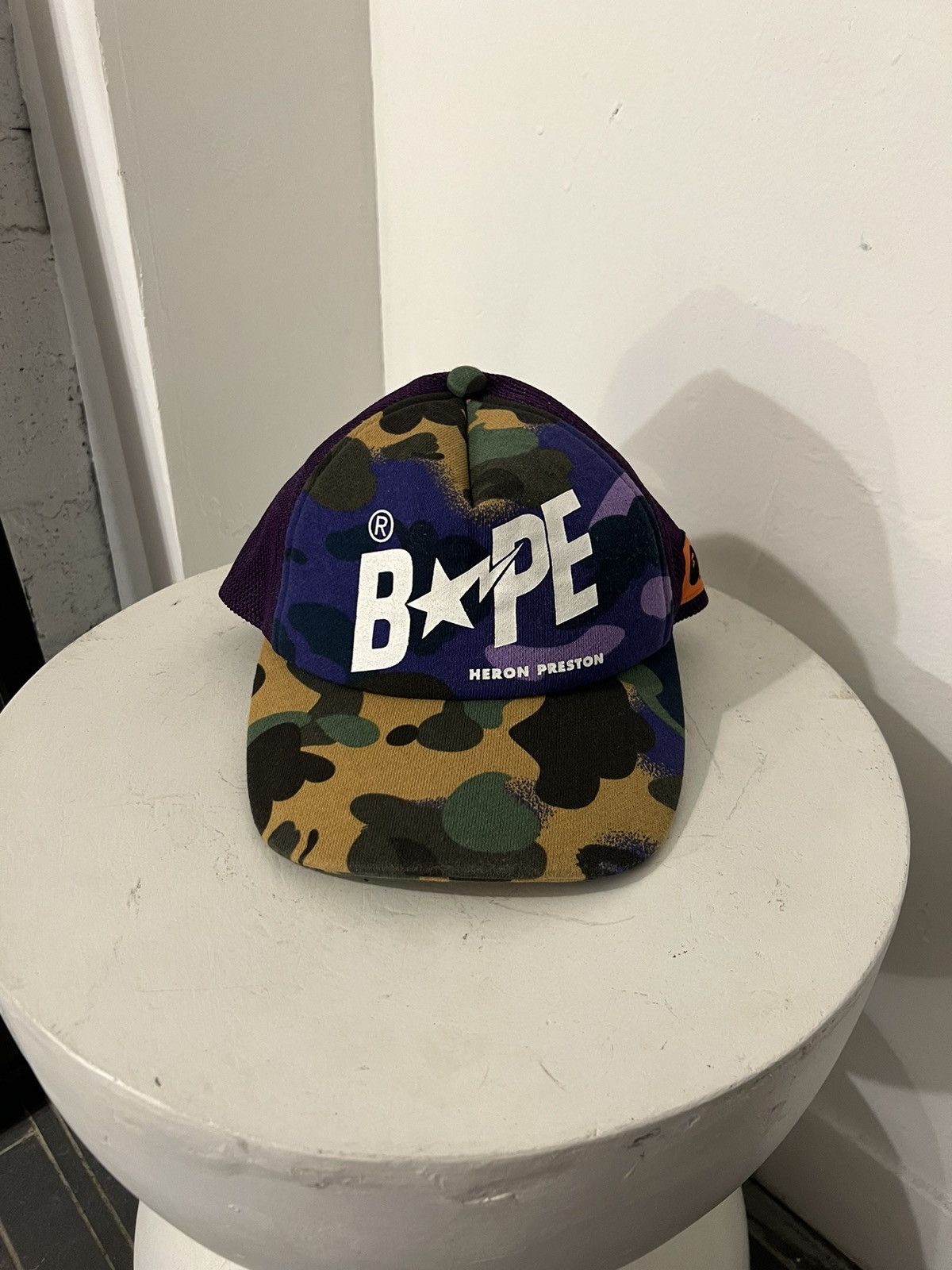 image of Bape X Heron Trucker Hat in Purple, Men's