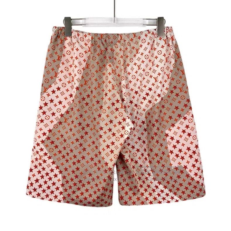 Louis Vuitton Pink Logo Star Print Shorts.