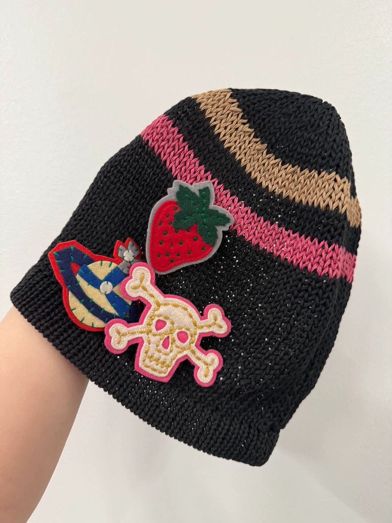 Vivienne Westwood Weave a cold cap for a newsboy