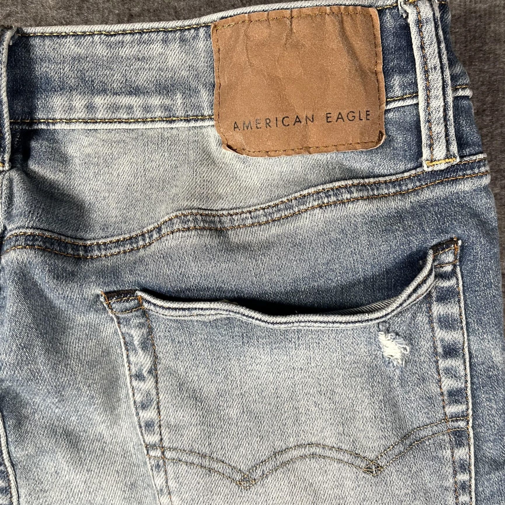 American Eagle Outfitters American Eagle Jeans Mens 32x34 Light Wash AirFlex+ Move-Free Skinny Distressed Jeans Mens Regular 32x34 Blue 5-Pocket Distressed Comfortable Size US 32 / EU 48 - 4 Thumbnail