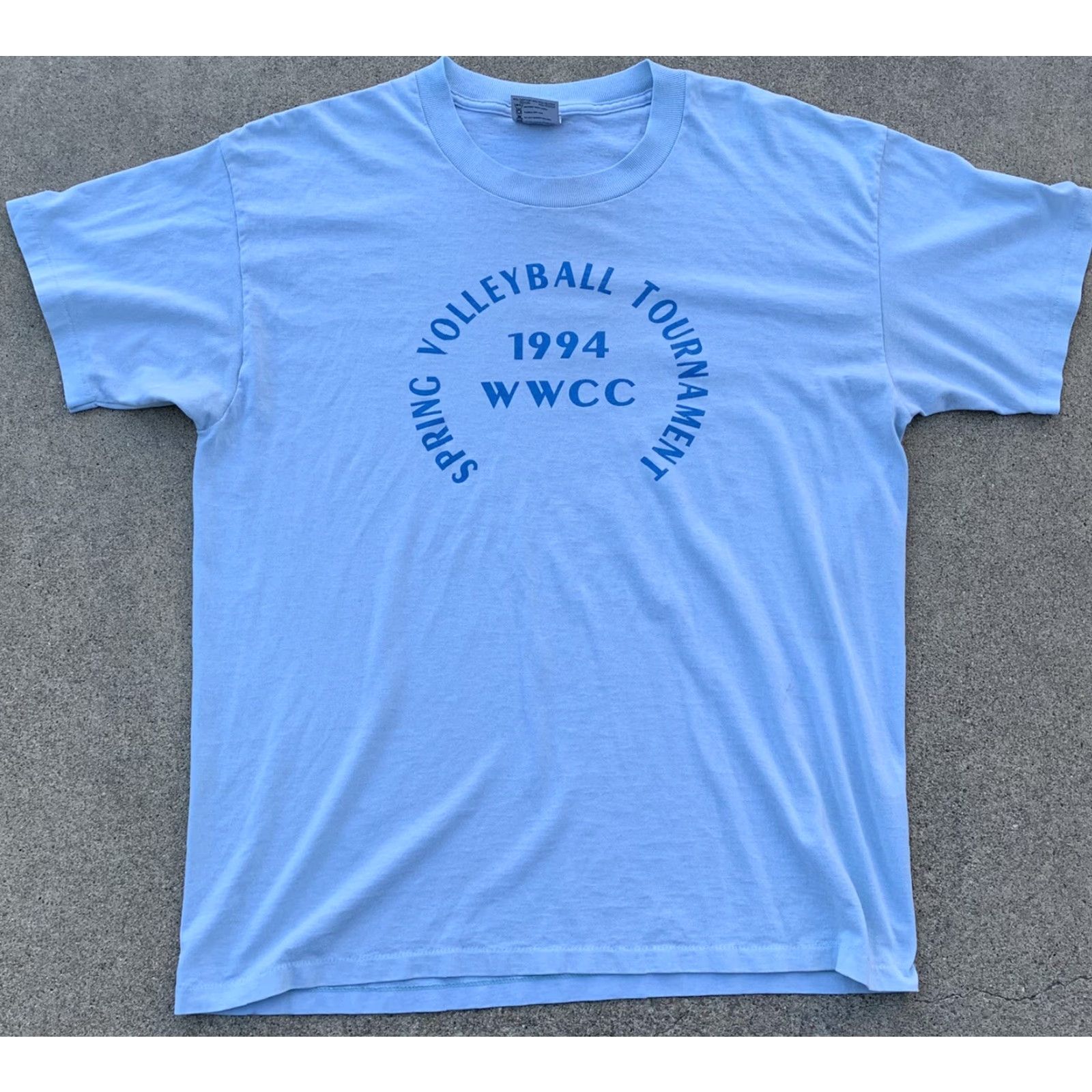 Vintage vintage 1994 WWCC Spring Volleyball Tournament t shirt single stitch XL blue Oneita Power/50 plus graphic print Men T-Shirt 90s Sports Size US XL / EU 56 / 4 - 6 Thumbnail