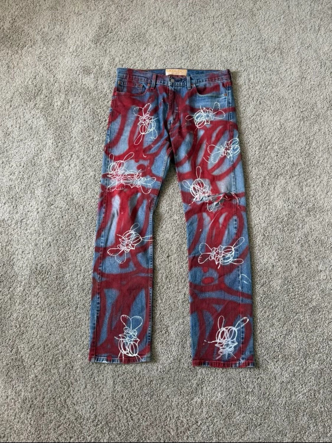 Skoloct Skoloct hand painted graffiti jeans | Grailed