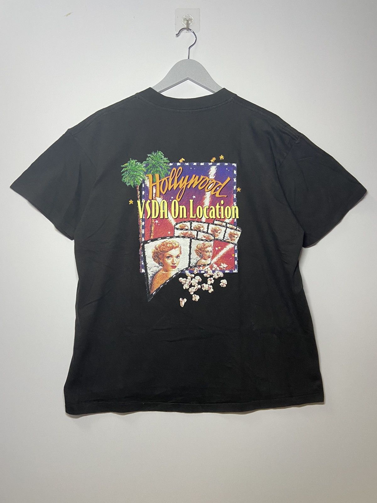 image of Made In USA x Planet Hollywood Vintage Hollywood Vsda In Location 1996 Tee Shirt in Black (Size Lar