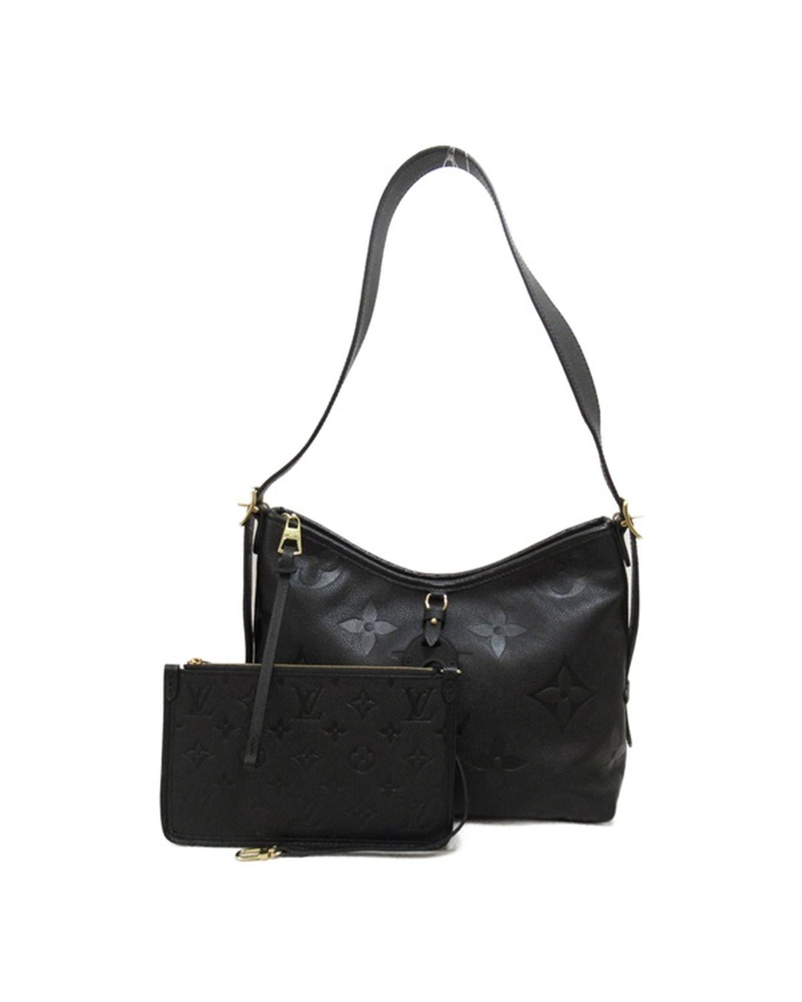 image of Louis Vuitton Black Monogram Empreinte Carryall Pm Bag In Ab Condition, Women's