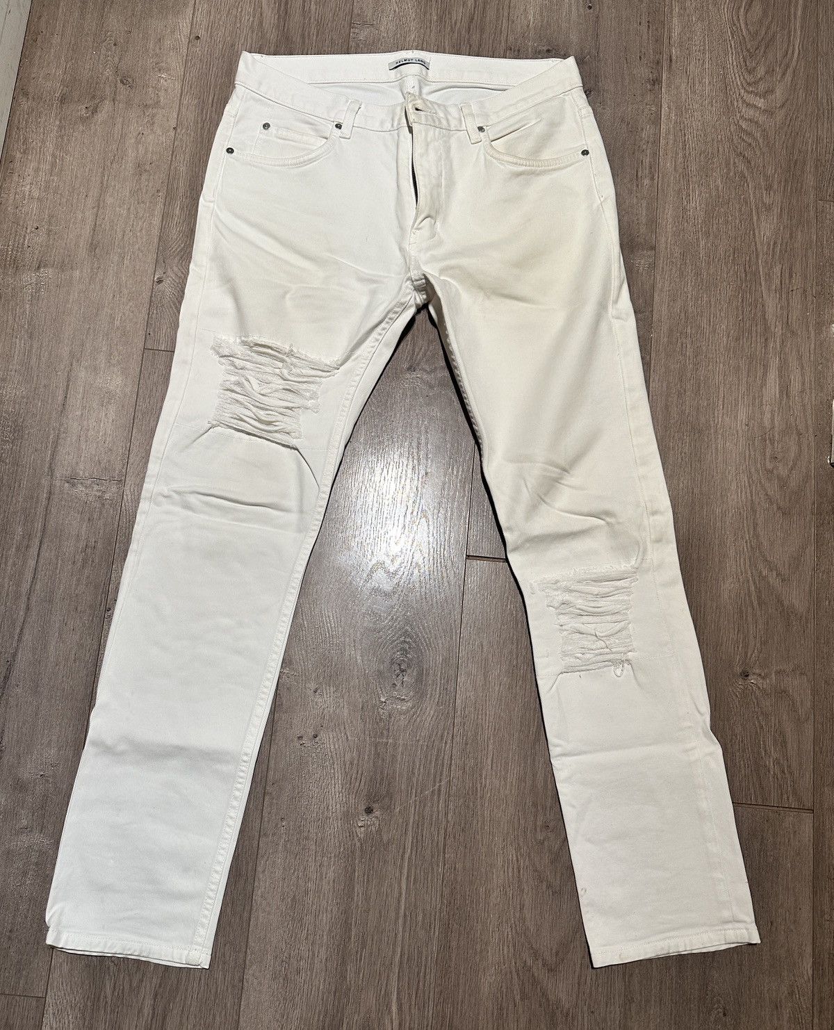 Distressed White Denim