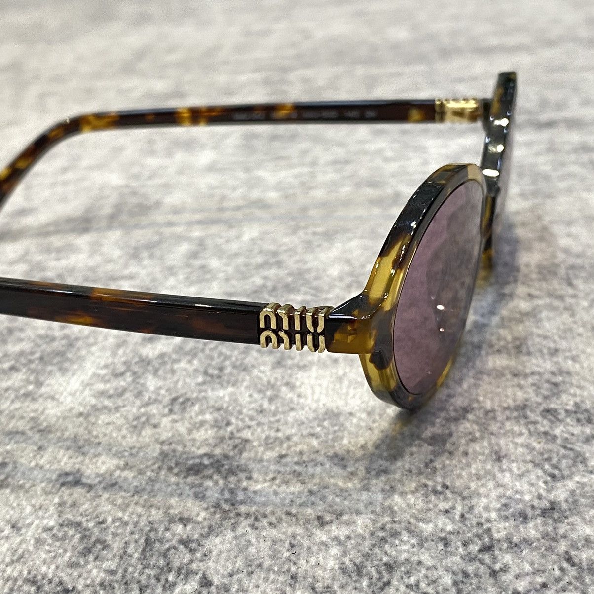 Miu Miu MIU MIU MU 04ZS VAU50D Eyewear HONEY Size ONE SIZE - 5 Thumbnail