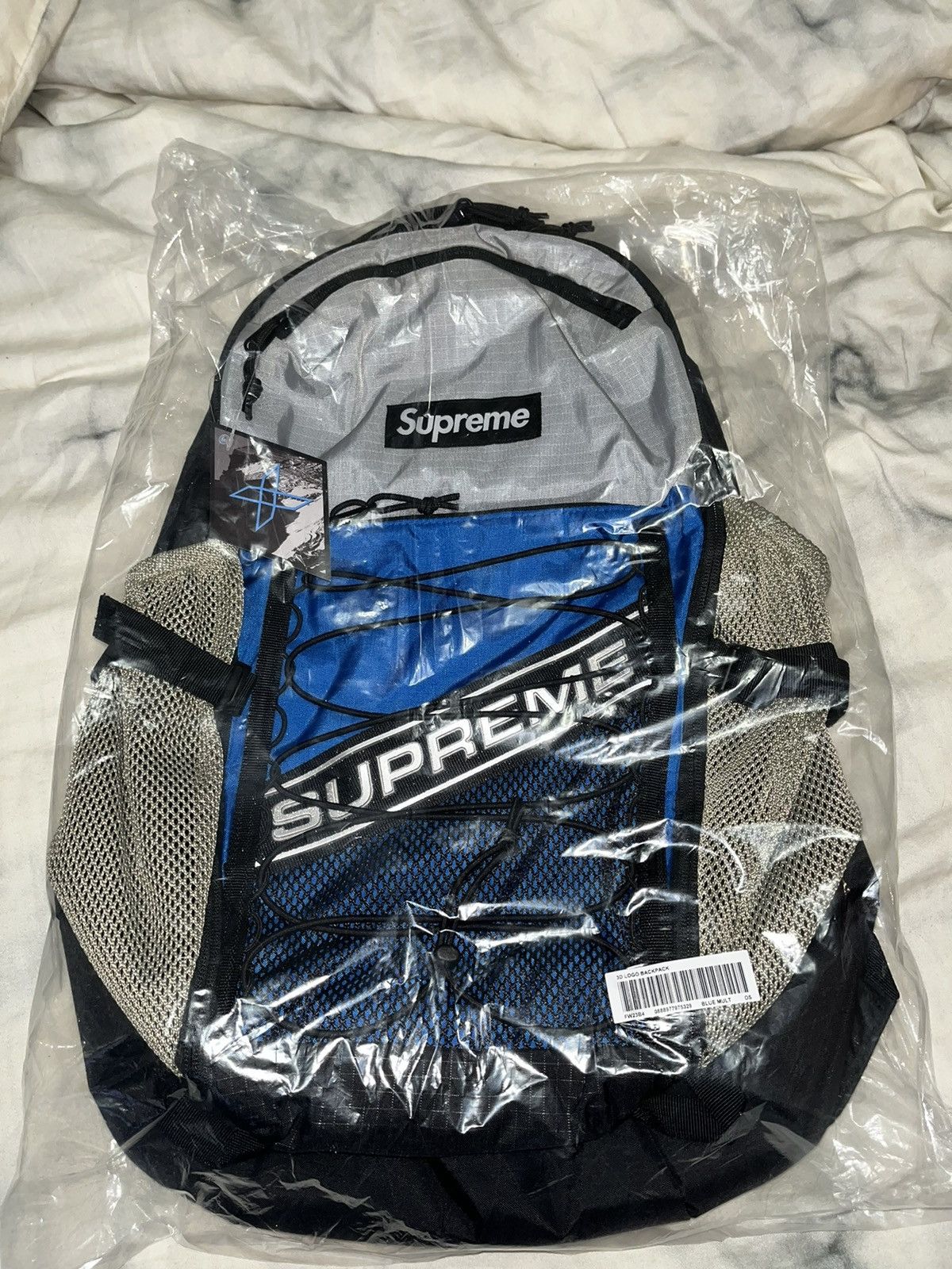 Supreme logo-patch Backpack - Blue