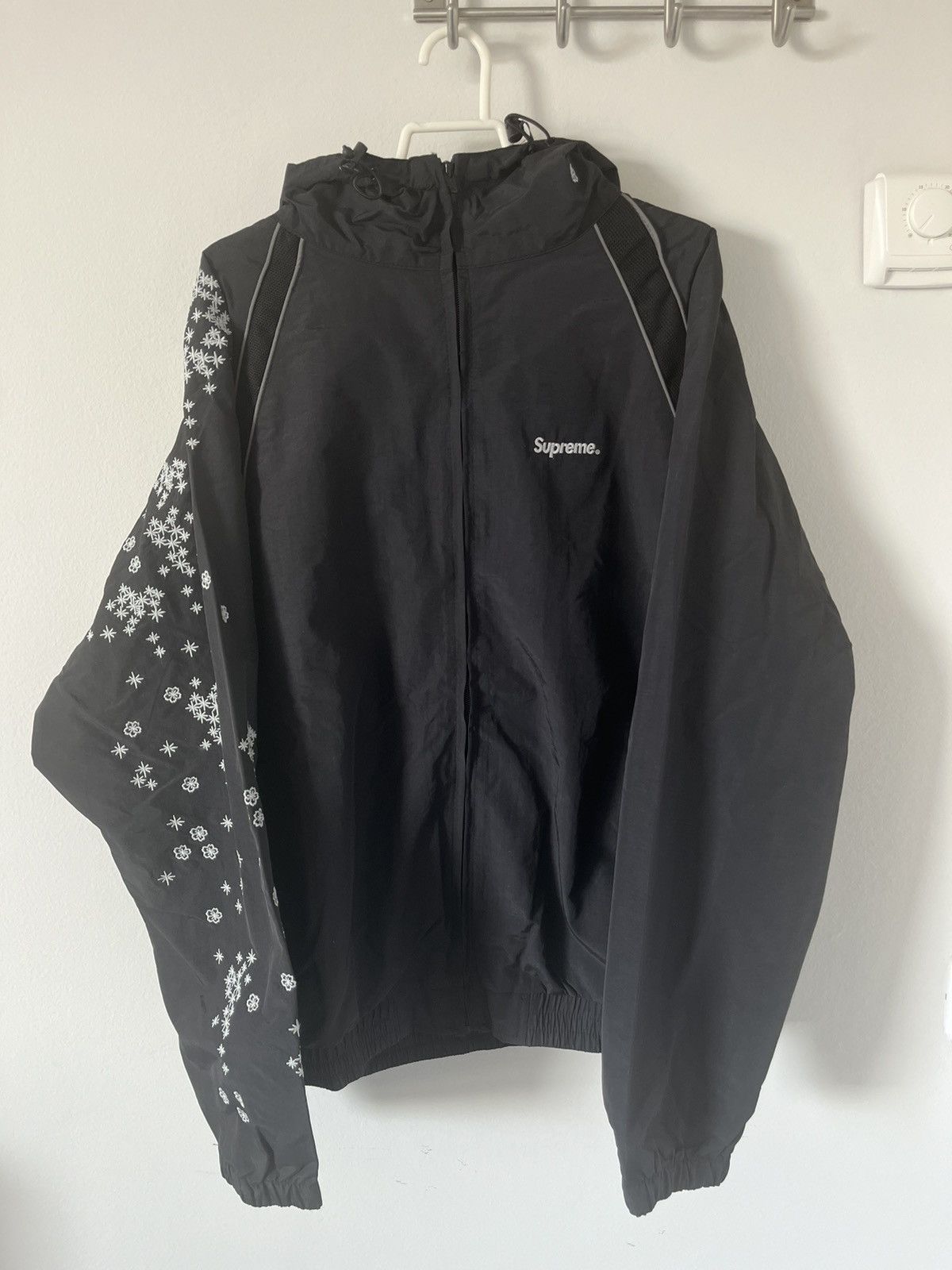 Supreme Supreme AOI glow in the dark track jacket | Grailed