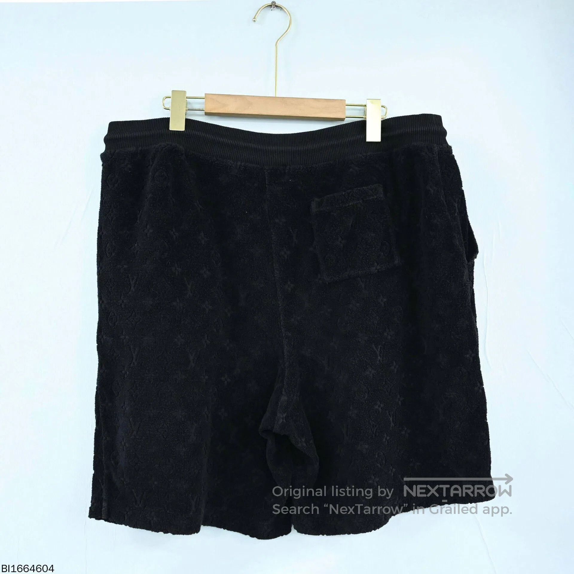louis vuitton logo drawstring shorts in black.