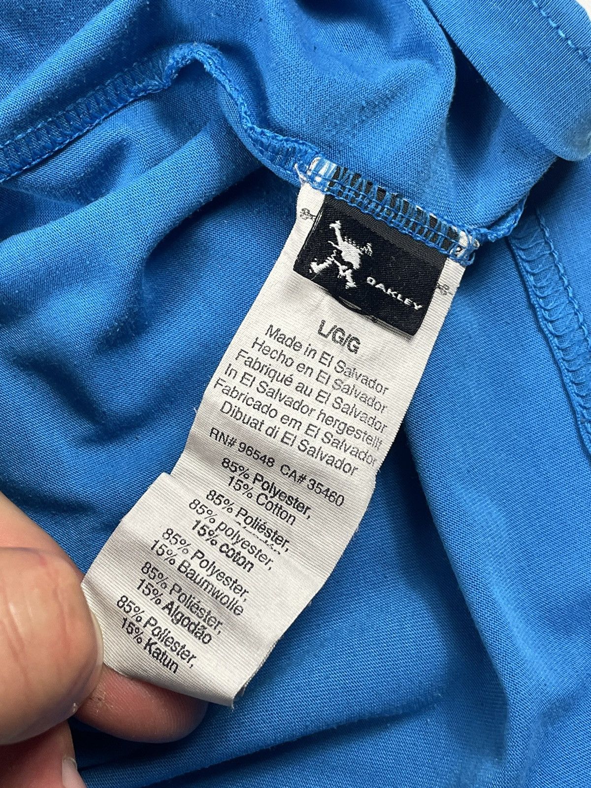 Oakley Oakley t shirt sport Logo rare classic blue surf skate drill Size US L / EU 52-54 / 3 - 5 Thumbnail